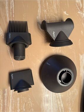 Four Dyson attachments for you hair dryer - all new without box